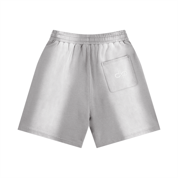 Sun Fade Distressed Shorts by ODMPOD