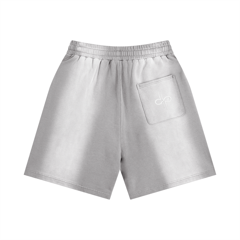 Sun Fade Distressed Shorts by ODMPOD